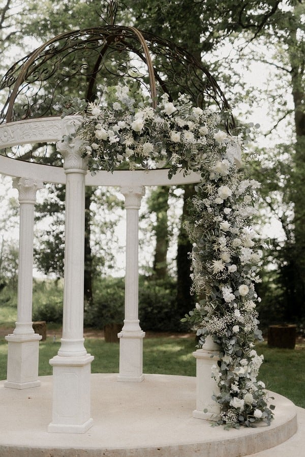 Elegant wedding ceremony floral decor