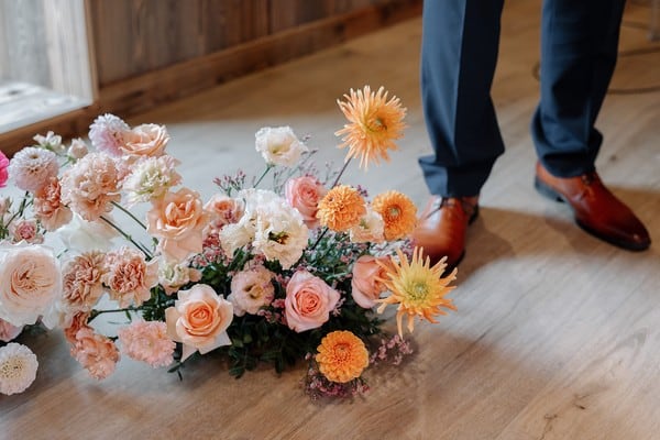 Floral arrangement on the ground for a wedding ceremony