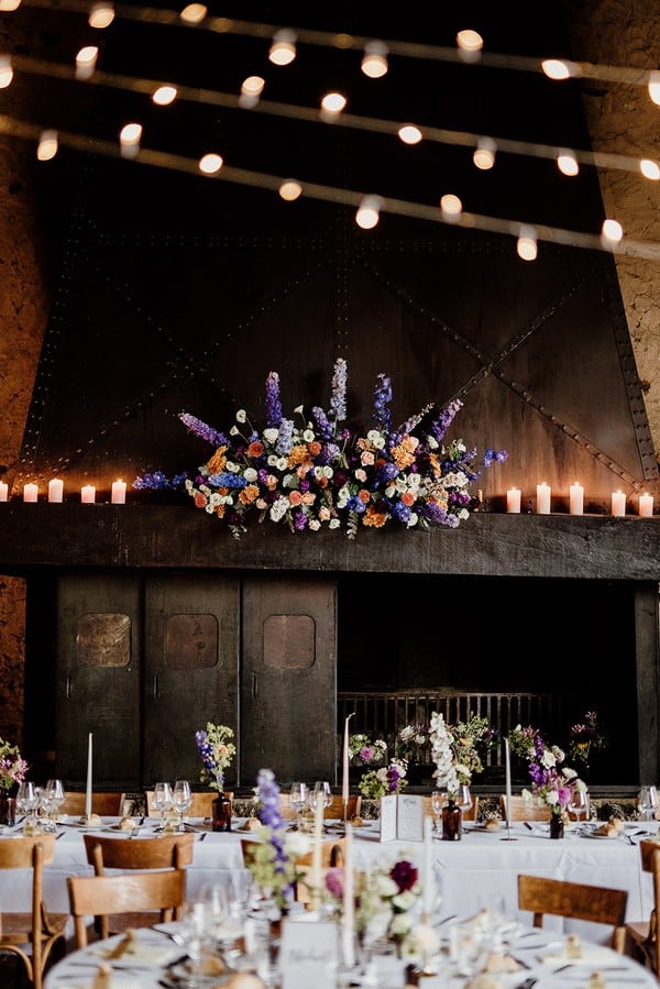 Elegant fireplace floral decor with candles
